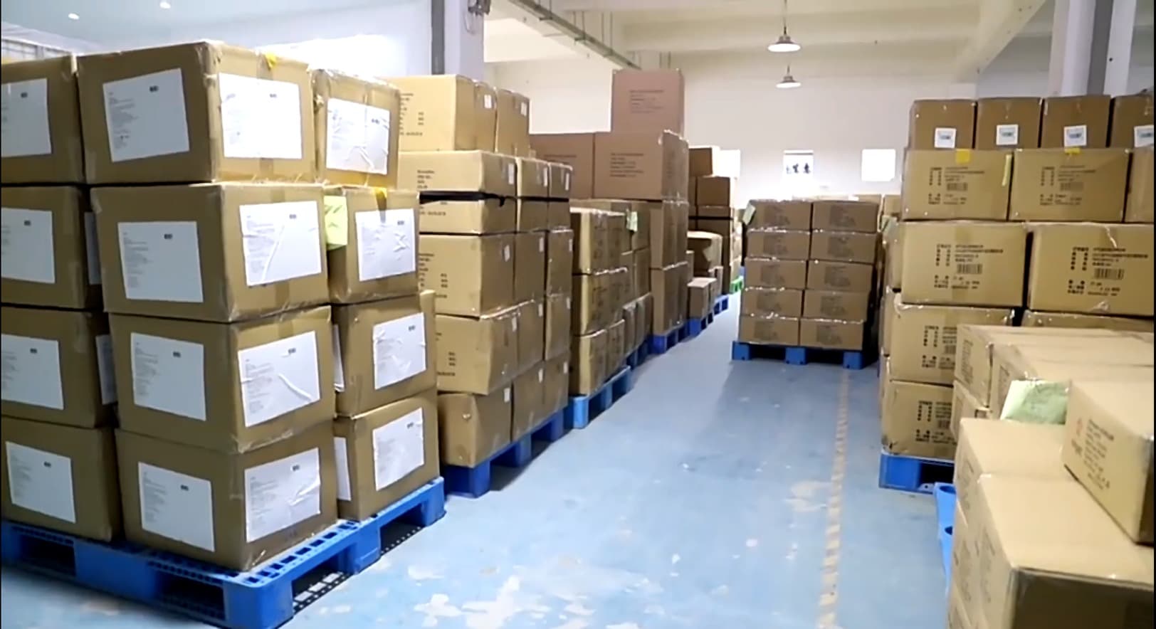 Warehouse stacked with packed export cartons